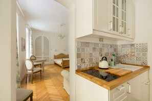 Apartment | Private kitchenette | Full-sized fridge, stovetop, electric kettle, cookware/dishes/utensils - Vintage Style Apartment (Budapest)