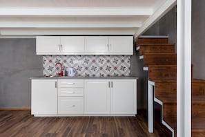Apartment (Split Level) | Private kitchenette | Full-size fridge, stovetop, cookware/dishes/utensils