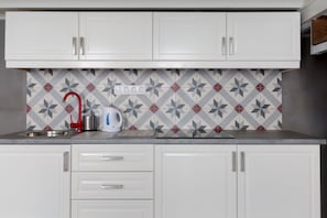 Apartment (Split Level) | Private kitchenette | Full-size fridge, stovetop, cookware/dishes/utensils