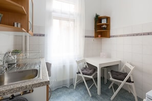Apartment | Private kitchen | Full-size fridge, microwave, oven, stovetop