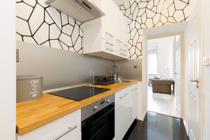 Apartment | Private kitchen | Full-sized fridge, microwave, oven, stovetop