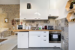 อพาร์ทเมนท์ | ครัวส่วนตัว | ตู้เย็นขนาดใหญ่, ไมโครเวฟ, เตาอบ, เตาประกอบอาหาร