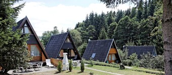 Wooden Chalet with Terrace near Swimming Lake