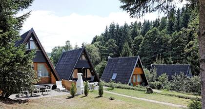 Wooden Chalet with Terrace near Swimming Lake