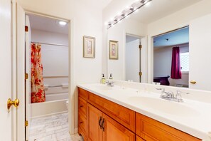 Hair dryer, towels - Inviting condo in quiet locale with partial lake views, balcony & grilling area (Gilford)