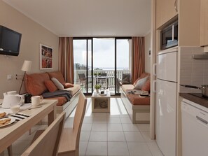 Apartment | Private kitchen | Fridge, microwave, oven, dishwasher - Attractive Studio With a Dishwasher, in a Cozy Coastal Town (Le Lavandou)