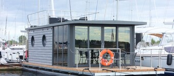 Houseboat Fjord Lacerta with roof terrace in Wendtorf