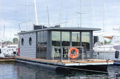 Houseboat Fjord Lacerta with roof terrace in Wendtorf