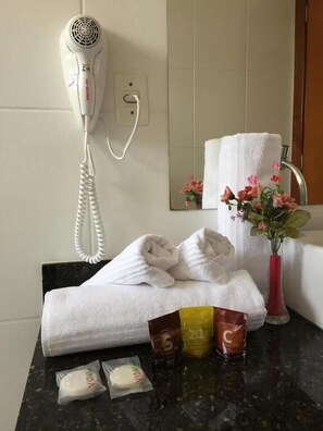 Shower, free toiletries, towels, soap