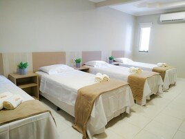 Standard Quadruple Room | Minibar, laptop workspace, free WiFi, bed sheets