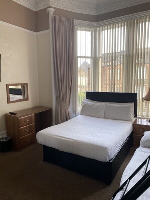 Family Triple Room | Premium bedding, iron/ironing board, free WiFi, bed sheets