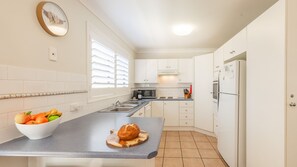 Fridge, microwave, oven, stovetop - 1/94 Rocky Point Rd - Duplex with Aircon, Foxtel and Short Walk To The Sports Club (Fingal Bay)