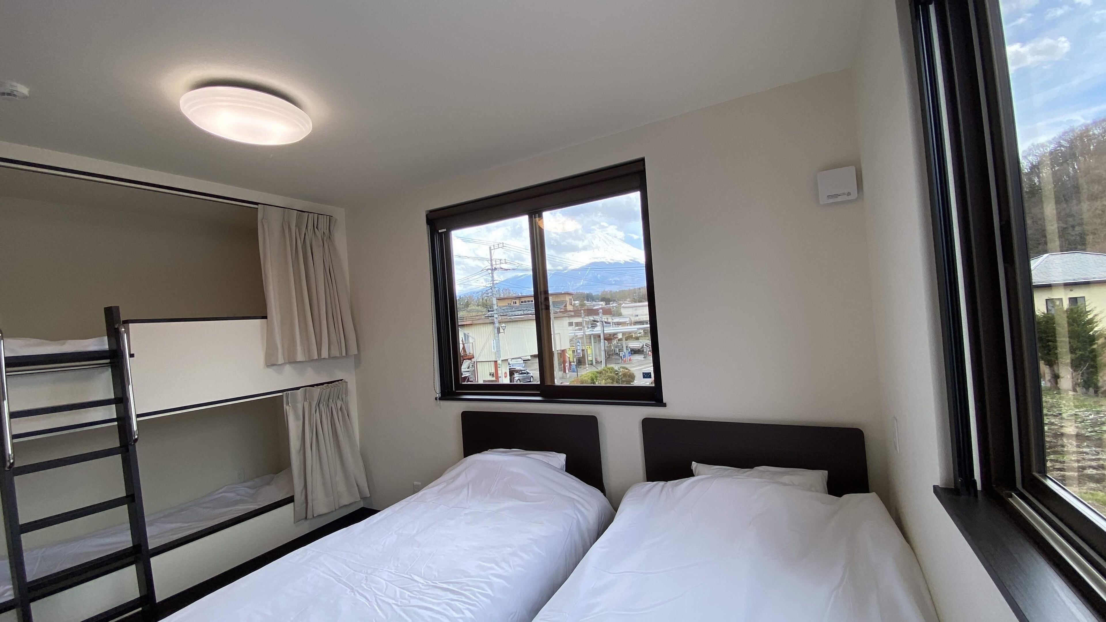 2 dormitorios, cortinas opacas, wifi gratis y ropa de cama