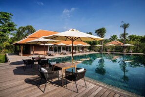 2 outdoor pools, open 10:00 AM to 8:00 PM, pool umbrellas, pool loungers