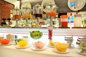 Enjoy a wide selection of food and beverages at our self-service buffet.