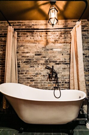 Combined shower/tub, hair dryer, towels, soap