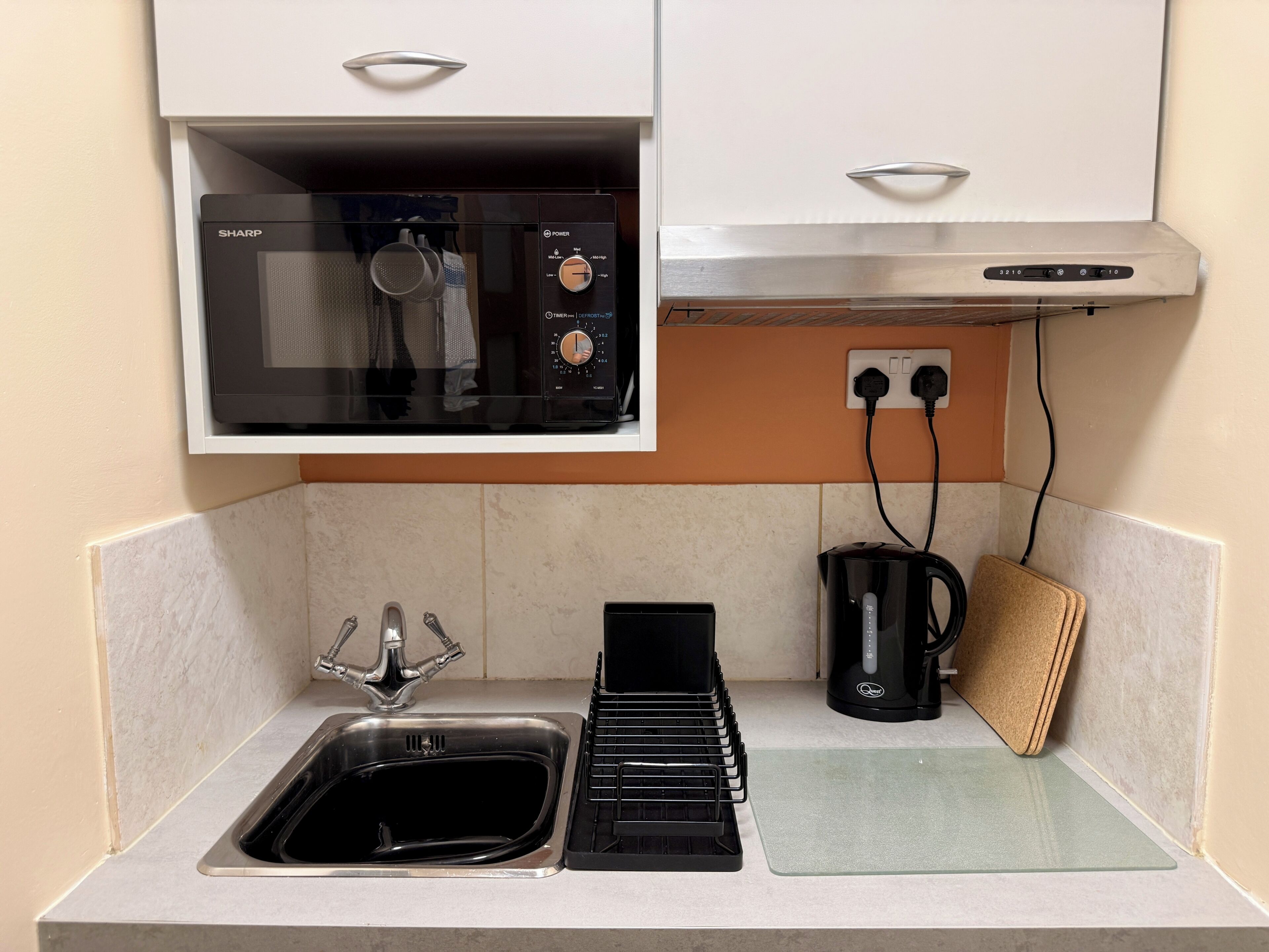 Fridge, microwave, stovetop, cookware/dishes/utensils