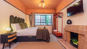 1 bedroom, desk, iron/ironing board, travel cot