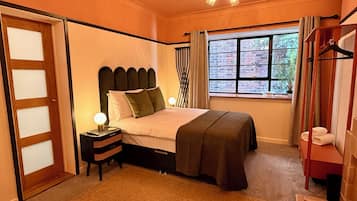 1 bedroom, desk, iron/ironing board, travel cot