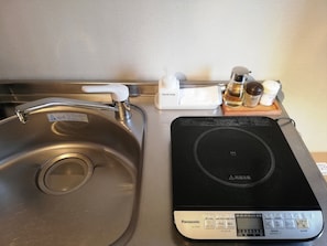 Fridge, microwave, stovetop, cookware/dishes/utensils