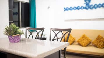 Deluxe Apartment, Multiple Beds, Kitchen | Living area | 40-inch Smart TV with digital channels, Netflix, streaming services