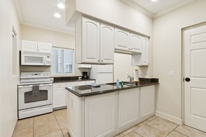 Fridge, microwave, coffee/tea maker, toaster