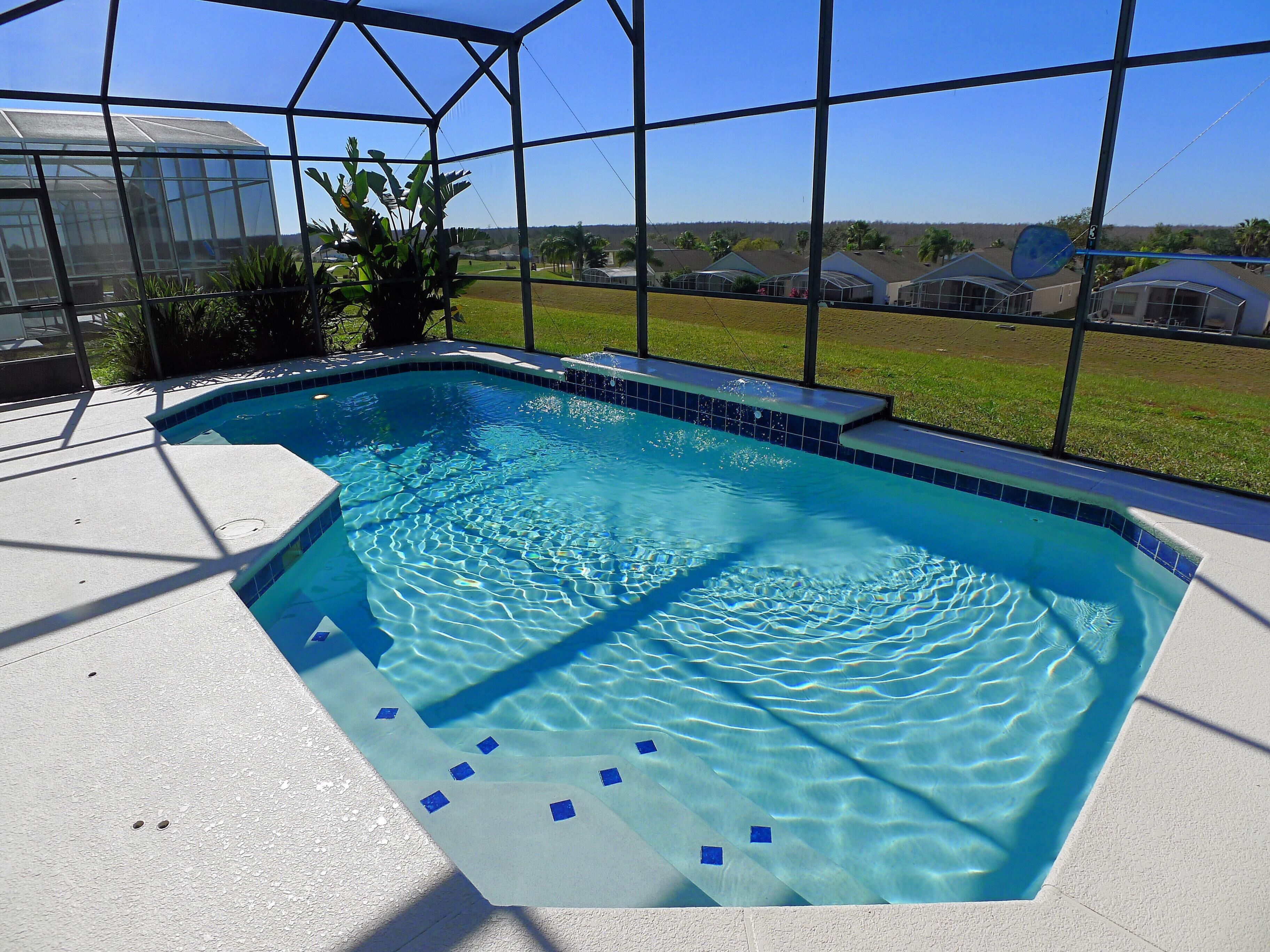 Overlooking the golf course with spacious interior!