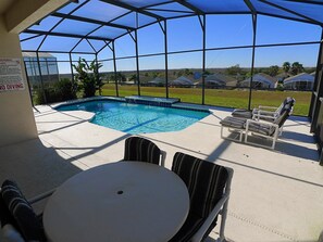 A heated pool, pool loungers