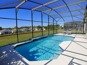 A heated pool, pool loungers
