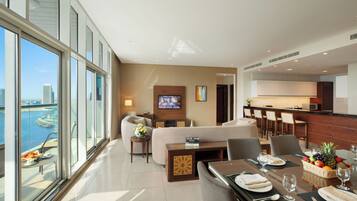 Deluxe Apartment, 3 Bedrooms (Burj Khalifa View) | Living area | Flat-screen TV
