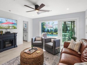 Smart TV, fireplace, books