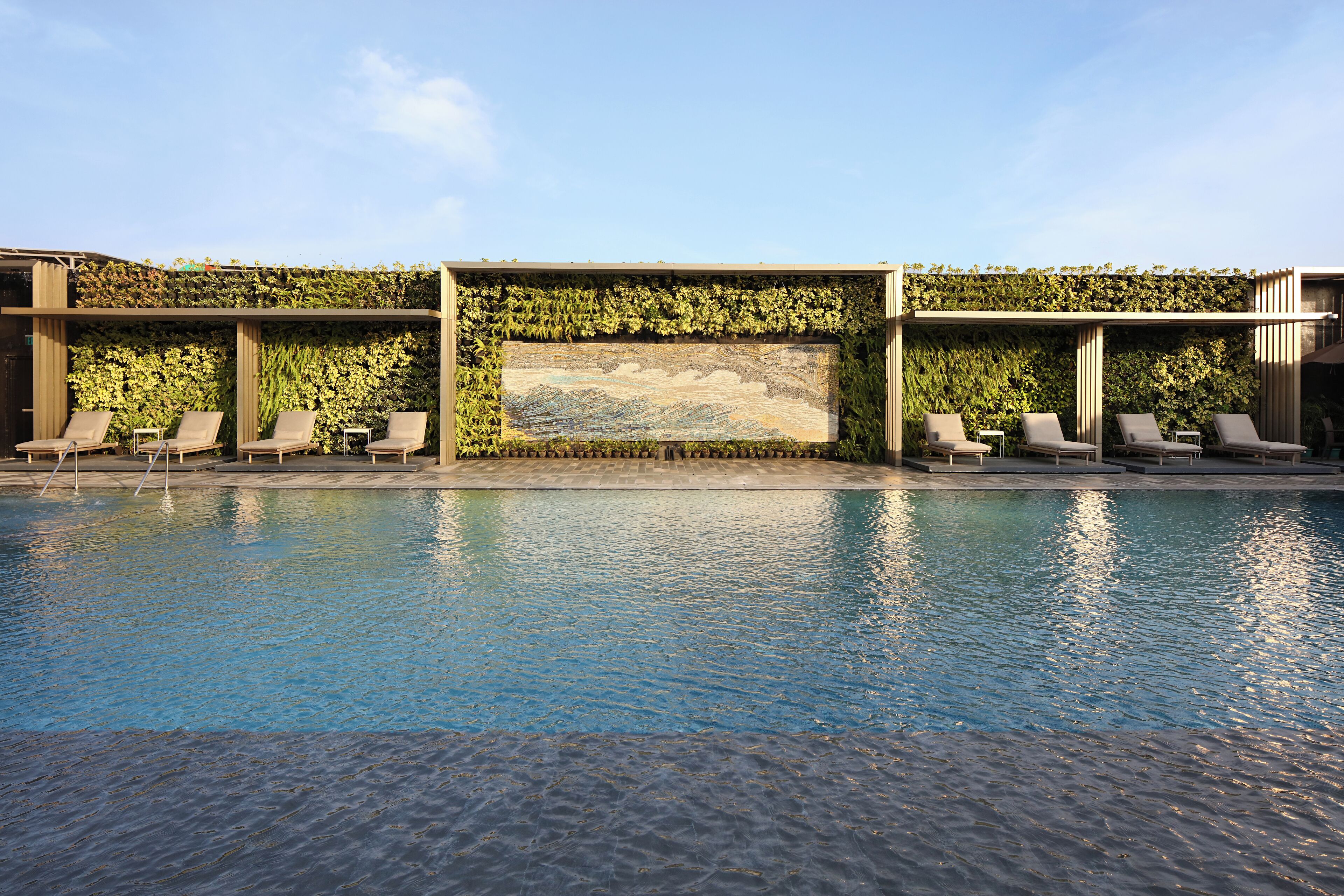 outdoor pool, pool umbrellas, pool loungers