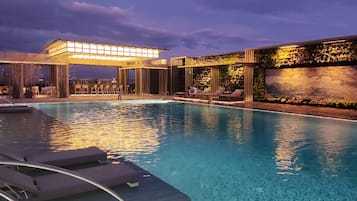 Outdoor pool, pool umbrellas, pool loungers