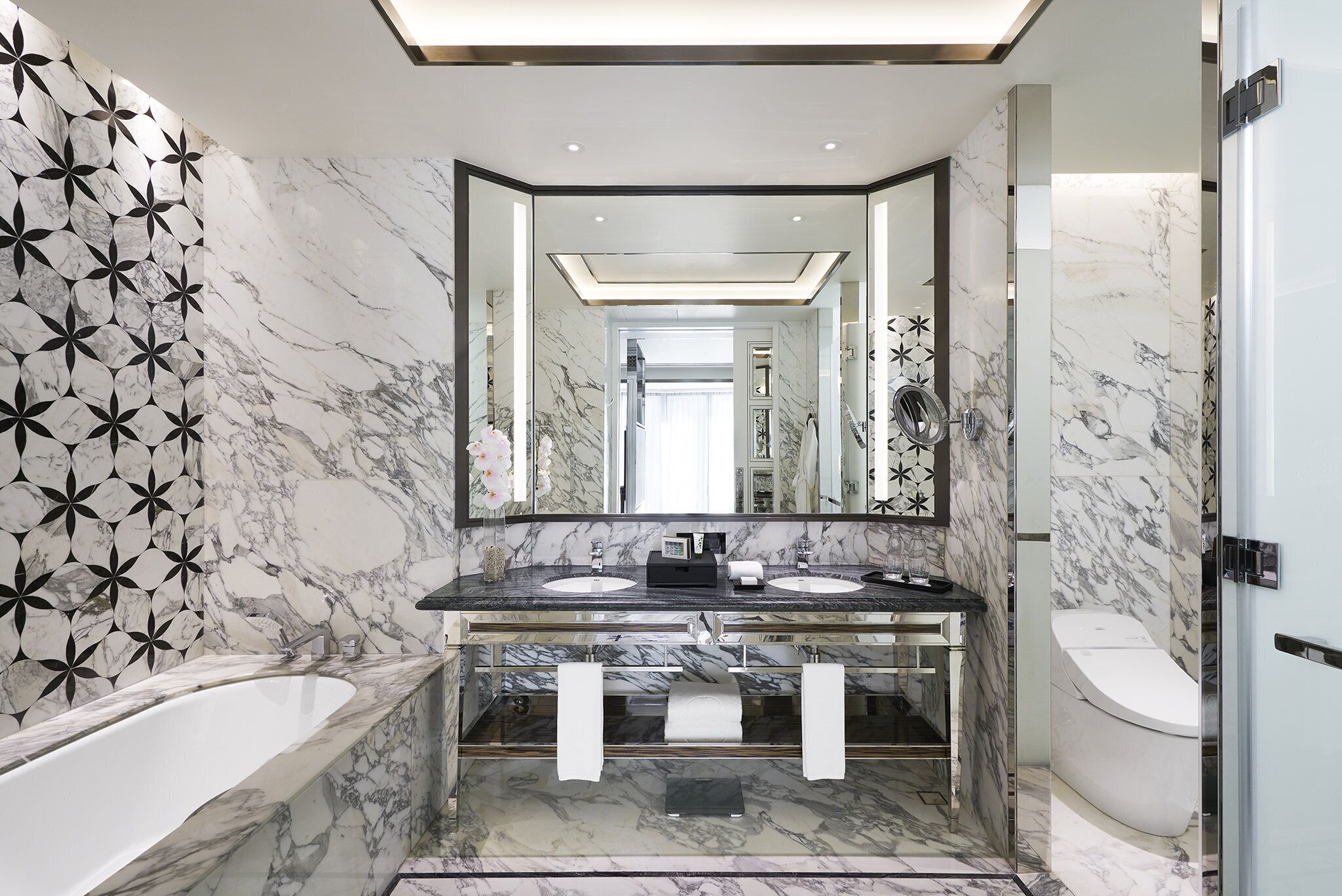 separate bathtub and shower, deep-soaking bathtub, rainfall showerhead