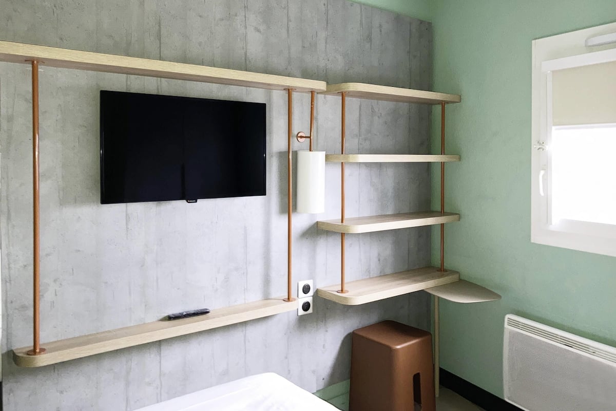 Blackout drapes, soundproofing, iron/ironing board, free WiFi