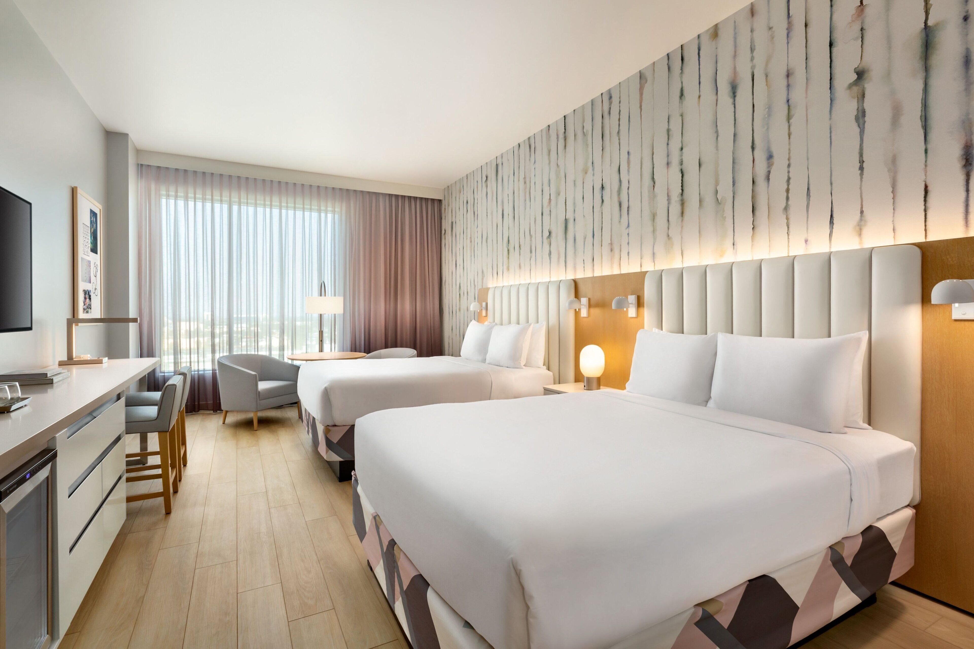 Premium bedding, down comforters, in-room safe, desk