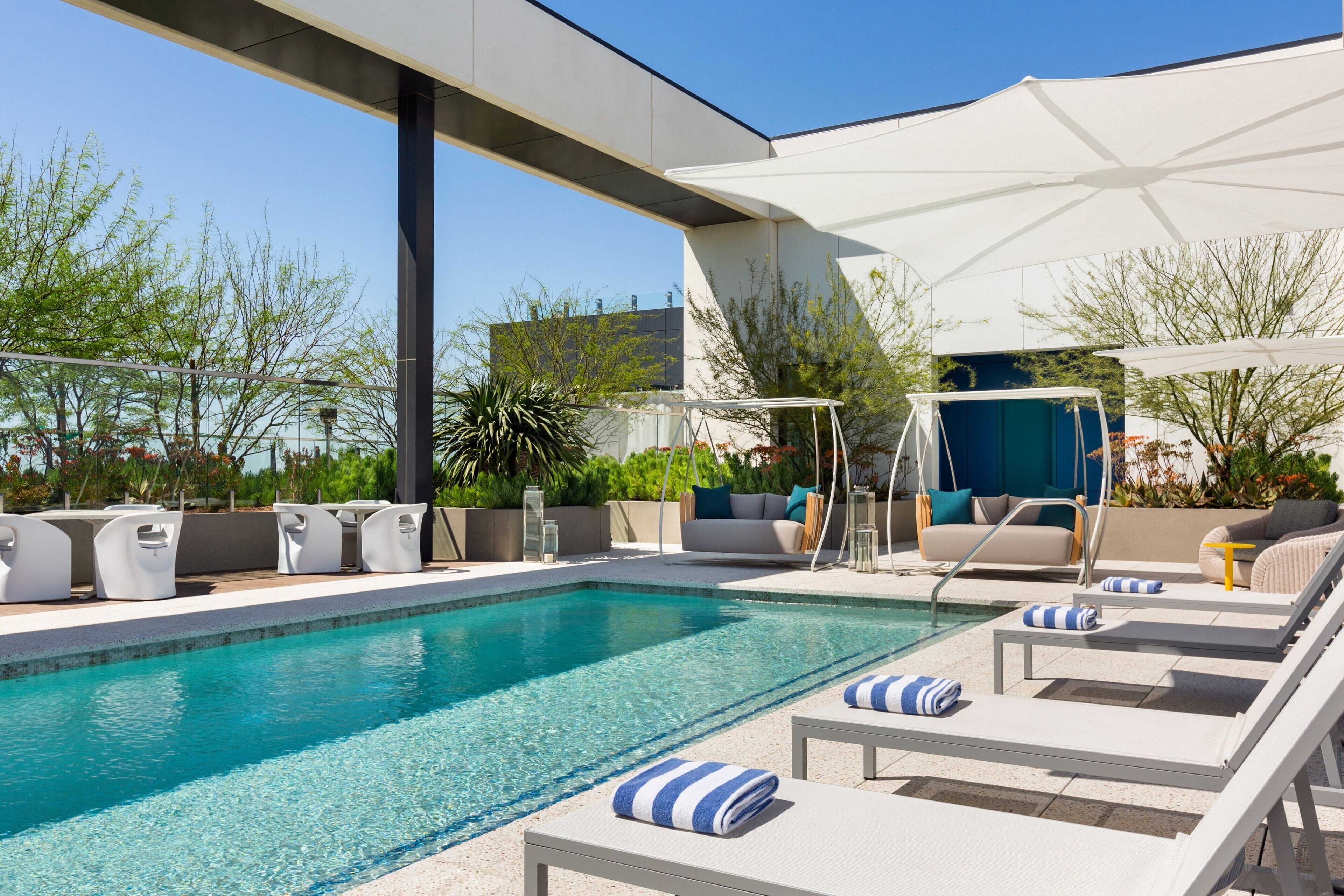 2 outdoor pools, open 9:00 am to 10:00 pm, pool cabanas (surcharge)