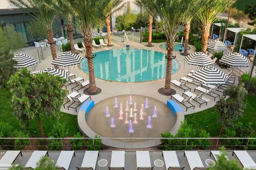 2 outdoor pools, open 9:00 AM to 10:00 PM, pool cabanas (surcharge)