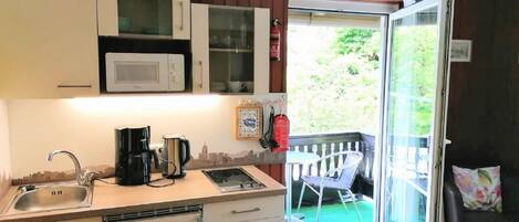 Apartment | Private kitchen | Microwave, highchair