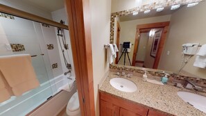 Combined shower/bathtub, hair dryer