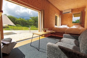 Cabaña de lujo | Ropa de cama de alta calidad y artículos del minibar gratis