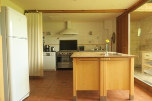 Dishwasher, coffee/tea maker, cookware/dishes/utensils