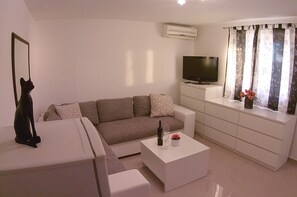 อพาร์ทเมนท์, 1 ห้องนอน, ระเ  บียง | ห้องนั่งเล่น