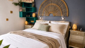 A bedroom with a bed, a nightstand, a wall-mounted shelf, and a wall art piece. - Apartment With Breathtaking sea View (Trogir)