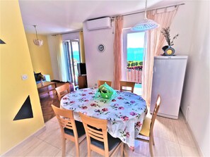 Apartment, 2 Bedrooms, Smoking, Balcony | Dining