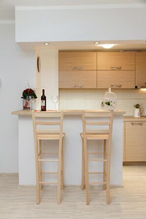 Apartamento luxo | Opções para refeição no quarto