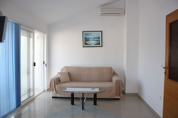 Departamento, 1 habitación, balcón, vista al océano | Sala de estar