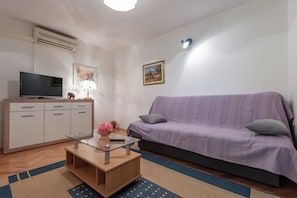Apartment, 2 Bedrooms, Accessible, Smoking | Living room | TV