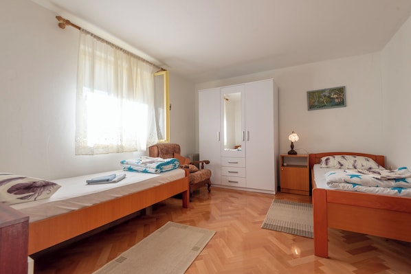 2 bedrooms, iron/ironing board, travel crib, bed sheets