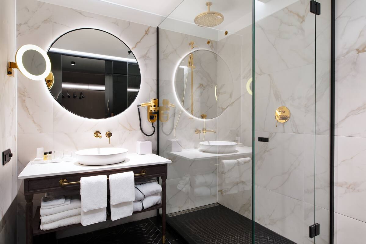 eco-friendly toiletries, hair dryer, bathrobes, slippers